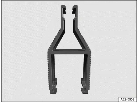 Fig. 2 Pince en plastique pour le retrait ou le